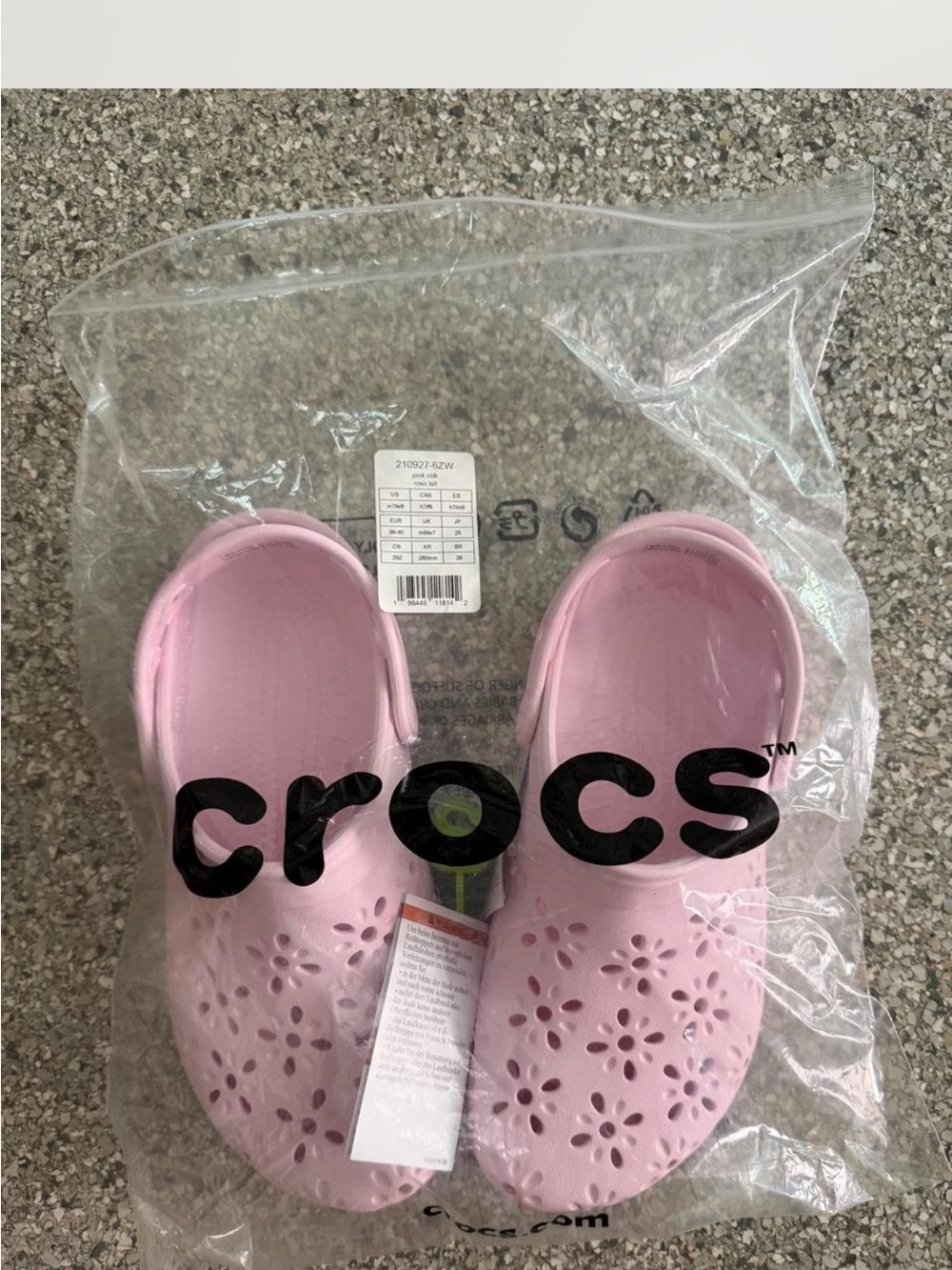 Brand new floral CROCS Women’s Pink Floral-Perforated Clogs- size 9